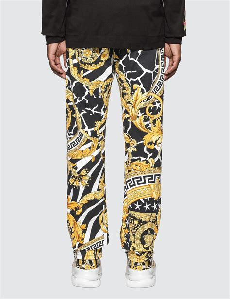 vintage versace stretch pants|Versace denim pants.